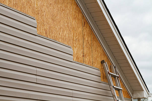 Professional Siding Installation technician working in Winchester, TN